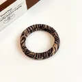 Retro animal print hair scrunchie with high elasticity and brown zebra pattern textures - Black Stripe