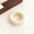 Creamy beige thick knit hair tie with textured elastic fabric in a round shape - Off White