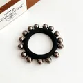 Elastische zwarte haarelastiek met elegante donkere metalen kralen voor dames - Gunmetal