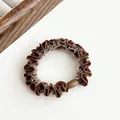 Dark brown pleated scrunchie with decorative smooth bead for elegant hairstyles - Brown