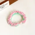Pink and mint green patchwork elastic hair scrunchie with smooth oval bead accent - Pink