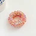 Pastel pink and purple macaron-colored braided scrunchie with soft feather texture - Red
