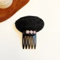 Invisible black hair volume bump pad with pink rhinestone flower detail and 5-tooth comb - Pink