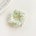 Green and white knitted elastic hair tie with textured finish for ponytail - Green