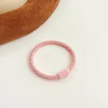 Pink elastic hair tie with twisted texture and matching plastic connector for kids - Pink