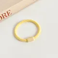 Pale yellow high-elasticity woven hair tie with minimalist beige cylindrical connector - Yellow