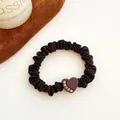 Brown elastic scrunchie with heart-shaped accessory and champagne crystal detail - Heart-Dark Coffee