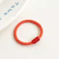 Elastic orange spiral hair tie with a durable red plastic connector for kids' hairstyles - Orange