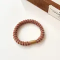 Elastische gevlochten haarelastiek in roodbruin en beige met hars gesp - Khaki