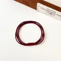 Élastique à cheveux rouge foncé haute résistance au design minimaliste multibrins - Bordeaux