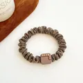 Brown ribbed fabric scrunchie featuring a matte square buckle with sparkling rhinestones - Square-Light Coffee