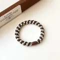 Elastisches gewebtes Haargummi in Kaffeebraun und Creme mit einer glatten Perle - Dunkelbraun