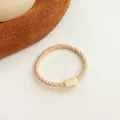 Élastique cheveux beige torsadé avec boucle assortie pour coiffure enfant - Poche zippée