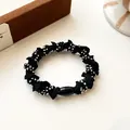 Elastic black ponytail holder with colorful polka dot beads and smooth oval buckle - Black