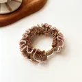 Coffee brown thick elastic scrunchie with lace edges and a decorative brown bead - Coffee