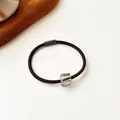 Brown high-elasticity hair tie featuring a sparkling iridescent crystal cylinder bead - Dark Brown