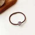 Brown high-elastic hair tie featuring a shimmering colorful cube bead decoration - Brown