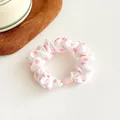 Polka dot scrunchie in white fabric with pink dots and a stylish rectangular buckle - Pink