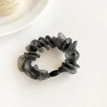 Elastic black organza scrunchie with sheer pleats and a glossy oval decorative bead - Gray