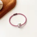 Elastic pink purple hair tie featuring a square iridescent crystal bead accessory - Dusty Pink