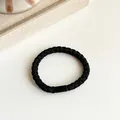 Classic black braided hair tie with a high-elasticity fiber finish and sleek black clasp - Black