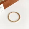 Élastique à cheveux doré scintillant sans couture avec texture tissée pour queue de cheval - Bleu foncé
