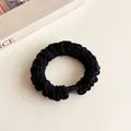 Thick black textured velvet hair tie with a rectangular clasp for elastic ponytails - Black