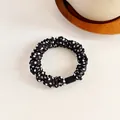 Polka dot hair scrunchie in black and white fabric with high elasticity for ponytails - Black