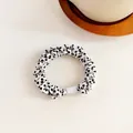 Polka dot hair scrunchie in white fabric with black spots for high elastic ponytails - White