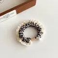 Elastic leopard print scrunchie with cream lace trim and elegant vintage finish - Light Coffee