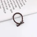 Braided dark brown twist ponytail holder with a bow knot on minimalist card - Grey Brown