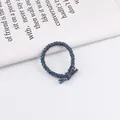 Blue braided elastic hair tie with a stylish knotted detail for girls and women - Blue Gray
