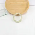 Élastique à cheveux spirale à fleurs avec motifs pastel sur base en résine crème - Vert