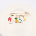 Detail of Christmas safety pin brooch with Santa Claus, Christmas tree and fruit charms - Design No.3