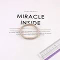 Elastic beige braided hair tie with durable thick design and high stretch for ponytails - Off White