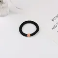 Élastique à cheveux noir élégant avec une perle pavée de strass en or rose - Noir