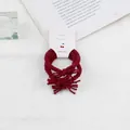 Set of dark red twisted braid hair ties with elegant ribbon bow detail on white card - Burgundy