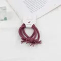 Set of 2 purple braided hair ties with elegant ribbon bows on premium white card - Dusty Pink