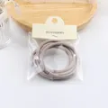 5-pack of high-elasticity hair ties in dusty purple with carded hangtag packaging - Gray