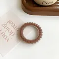Matte coffee-brown spiral telephone wire hair tie with elastic resin texture - Dark Coffee