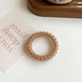 Brown matte spiral hair tie with high elasticity for elegant ponytails and daily styling - Light Coffee