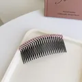 Pink glitter beaded hair comb hairpins for women on a journal in daily lifestyle scene - Pink