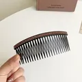 Haarkam met roze strassteentjes en zwarte harsbasis voor een elegante haarstijl - Paars