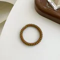 Dunkelbraunes Spiral-Haargummi aus elastischem Harz für hohe Pferdes Pferdeschwanz-Styling - Braun