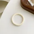 Cremefarbenes Spiral-Haargummi in Telefonkabel-Optik aus elastischem Material - Creme