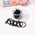 Lot de chouchous élastiques noirs minimalistes dans un bocal transparent pour la coiffure - Style Nœud / Noir