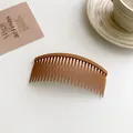 Matte caramel brown hair comb slide with multi-tooth curved design for secure styling - Khaki