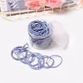Ensemble d'élastiques à cheveux bleus aux styles variés dans un bocal de rangement - Style Mixte / Bleu