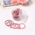 Ensemble d'élastiques à cheveux roses avec nœuds et perles dans un bocal de rangement - Style Mixte / Rose