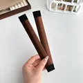 Set aus 2 braunen Haarknoten-Machern für französischen Twist und Dutt-Frisuren - Rotbraun